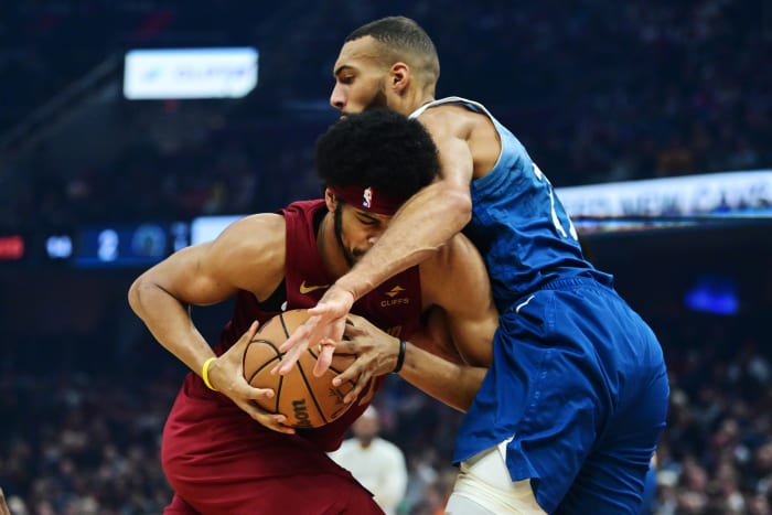 Mar 8, 2024; Cleveland, Ohio, USA; Cleveland Cavaliers center Jarrett Allen (31) drives to the basket against Minnesota Timberwolves center Rudy Gobert (27) during the first half at Rocket Mortgage FieldHouse.
